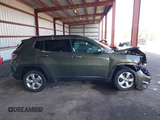 2018 Jeep Compass Altitude with VIN 3C4NJDBB4JT238950, listed as a IAAI auction lot 41815682 with 85,598 mi miles and . Bid and sale history available at DreamBid. Image 14.
