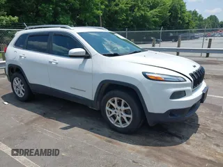 2016 Jeep Cherokee Latitude z VIN 1C4PJMCB2GW372592, wystawiony jako IAAI lot #42493346 z przebiegiem 95 519 mil mil oraz . Historia ofert i sprzedaży dostępna na DreamBid. Obrazek 1.