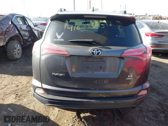 2016 Toyota RAV4 LE with VIN JTMBFREV1GJ085659, listed as a IAAI auction lot 41823575 with 141,657 mi miles. Bid and sale history available at carsss.com. Image 17.