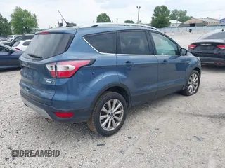 2018 Ford Escape Titanium z VIN 1FMCU0J91JUC00941, wystawiony jako IAAI lot #42679897 z przebiegiem 110 884 mil mil oraz . Historia ofert i sprzedaży dostępna na DreamBid. Obrazek 4.