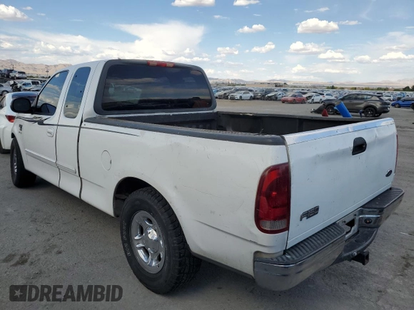 2002 Ford F-150 XL z VIN 1FTRX17W22NB22531, wystawiony jako Copart lot #54694475 z przebiegiem Nie podano mil oraz Szkoda całkowita • Salvage title. Historia ofert i sprzedaży dostępna na DreamBid. Obrazek 2.