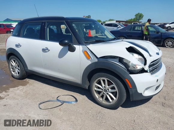 2015 MINI Countryman with VIN WMWZB3C55FWR43773, listed as a IAAI auction lot 42510137 with 150,764 mi miles and . Bid and sale history available at DreamBid. Image 1.