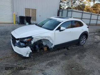 2020 Mazda CX-30 Premium with VIN 3MVDMAEMXLM102106, listed as a Copart auction lot 82964204 with 31,777 mi miles and Salvage title. Bid and sale history available at DreamBid. Image 1.