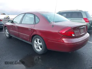 2002 Ford Taurus SE Standard z VIN 1FAFP53U32G242170, wystawiony jako IAAI lot #41299039 z przebiegiem 99 928 mil mil oraz . Historia ofert i sprzedaży dostępna na DreamBid. Obrazek 3.
