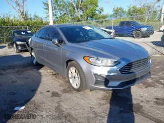 2020 Ford Fusion Hybrid SE with VIN 3FA6P0LU1LR221296, listed as a IAAI auction lot 41162977 with 26,660 mi miles. Bid and sale history available at carsss.com. Image 1.
