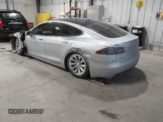 2017 Tesla Model S 100D with VIN 5YJSA1E23HF232059, listed as a IAAI auction lot 41394046 with 84,052 mi miles and . Bid and sale history available at DreamBid. Image 3.