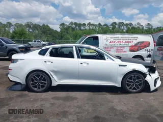 2020 Kia Optima LX z VIN 5XXGT4L38LG447472, wystawiony jako IAAI lot #42192053 z przebiegiem 84 972 mil mil oraz . Historia ofert i sprzedaży dostępna na DreamBid. Obrazek 14.