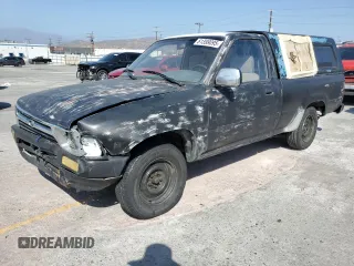 1990 Toyota Pickup with VIN JT4RN81A8L0045321, listed as a Copart auction lot 61399095 with 238,214 mi miles and Salvage title. Bid and sale history available at DreamBid. Image 1.