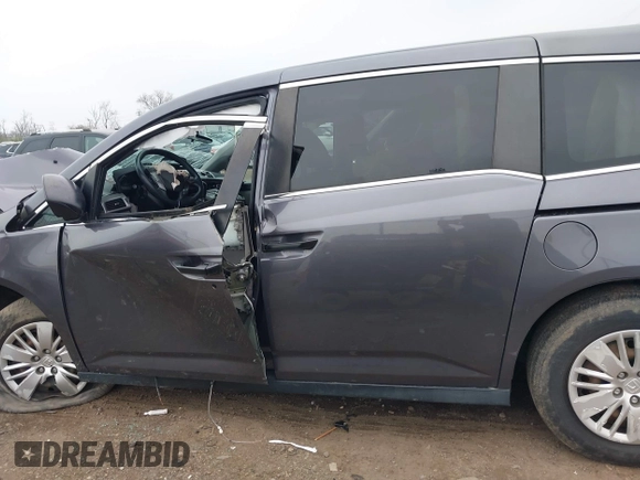 2015 Honda Odyssey LX с VIN 5FNRL5H21FB078427, выставлен на аукционе IAAI как лот 42000305 с пробегом Не указан миль и . История ставок и продаж доступна на DreamBid. Изображение 15.