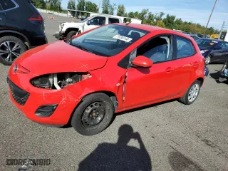 2011 Mazda Mazda2 Sport with VIN JM1DE1HY0B0108639, listed as a Copart auction lot 71036144 with 73,999 mi miles and Salvage Title. Bid and sale history available at carsss.com. Image 1.