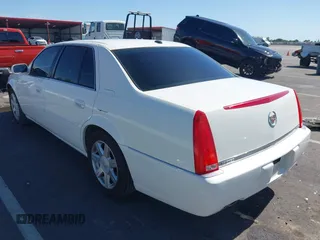 2007 Cadillac DTS Luxury I z VIN 1G6KD57Y77U133267, wystawiony jako IAAI lot #42337188 z przebiegiem 126 063 mil mil oraz . Historia ofert i sprzedaży dostępna na DreamBid. Obrazek 3.