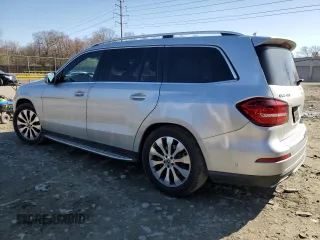 2019 Mercedes-Benz GLS 450 with VIN 4JGDF6EE8KB233053, listed as a Copart auction lot 49957755 with 68,676 mi miles and Salvage title. Bid and sale history available at DreamBid. Image 2.