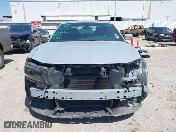 2022 Dodge Charger SXT with VIN 2C3CDXBG7NH204659, listed as a IAAI auction lot 41882695 with 49,773 mi miles and . Bid and sale history available at DreamBid. Image 13.