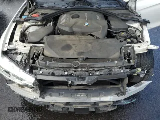 2018 BMW 3 Series 330i z VIN WBA8B9G56JNU96491, wystawiony jako Copart lot #50991795 z przebiegiem 65 764 mil mil oraz Szkoda całkowita • Salvage title. Historia ofert i sprzedaży dostępna na DreamBid. Obrazek 11.