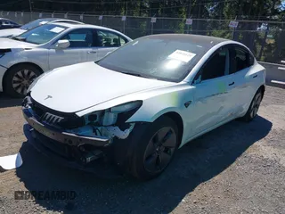 2023 Tesla Model 3 z VIN 5YJ3E1EA7PF611306, wystawiony jako IAAI lot #42826820 z przebiegiem 24 422 mil mil oraz . Historia ofert i sprzedaży dostępna na DreamBid. Obrazek 2.