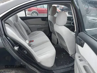 2010 Kia Optima LX with VIN KNAGG4A8XA5393660, listed as a IAAI auction lot 42006529 with 192,588 mi miles. Bid and sale history available at carsss.com. Image 8.