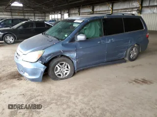 2006 Honda Odyssey EX-L with VIN 5FNRL38646B000103, listed as a Copart auction lot 49011715 with 240,268 mi miles and Salvage Title. Bid and sale history available at carsss.com. Image 1.
