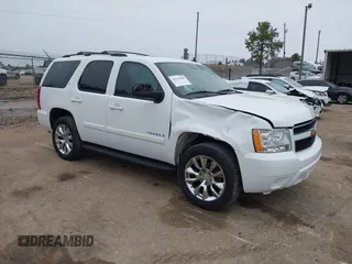 2009 Chevrolet Tahoe 2LT z VIN 1GNFC23079R200141, wystawiony jako IAAI lot #41531489 z przebiegiem Nie podano mil oraz . Historia ofert i sprzedaży dostępna na DreamBid. Obrazek 1.