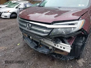 2016 Honda Pilot EX-L with VIN 5FNYF6H5XGB007876, listed as a IAAI auction lot 42366901 with 128,580 mi miles and . Bid and sale history available at DreamBid. Image 6.