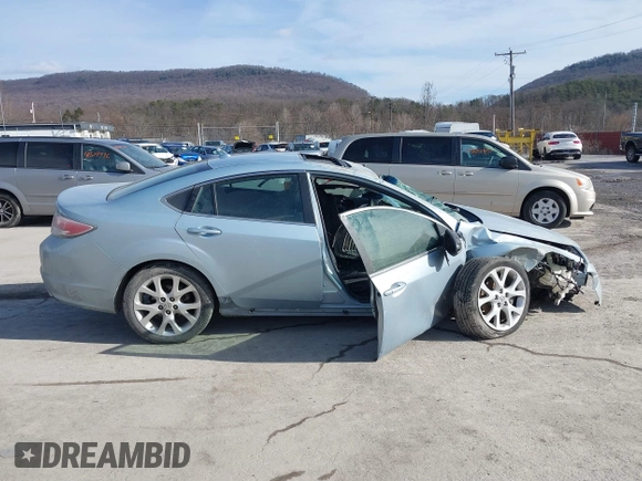 2009 Mazda 6 S Grand Touring with VIN 1YVHP82B595M21363, listed as a IAAI auction lot 41521753 with 135,000 mi miles and . Bid and sale history available at DreamBid. Image 13.