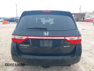 2011 Honda Odyssey Touring with VIN 5FNRL5H90BB070472, listed as a IAAI auction lot 42367710 with 203,589 mi miles and . Bid and sale history available at DreamBid. Image 16.