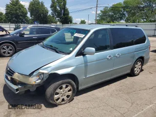 2004 Honda Odyssey EX-L with VIN 5FNRL18014B015462, listed as a Copart auction lot 62834665 with 323,817 mi miles and Salvage title. Bid and sale history available at DreamBid. Image 1.