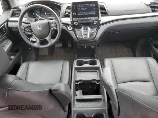 2022 Honda Odyssey Touring with VIN 5FNRL6H8XNB016064, listed as a Copart auction lot 65289595 with 24,946 mi miles and Salvage title. Bid and sale history available at DreamBid. Image 8.