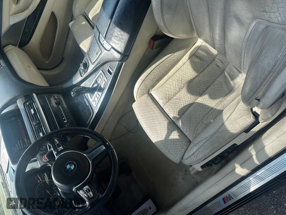 2014 BMW 6 Series 650i with VIN WBAYP9C54ED169297, listed as a Copart auction lot 56227155 with 123,829 mi miles and Clean Title. Bid and sale history available at carsss.com. Image 9.