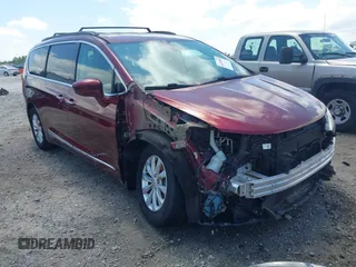 2017 Chrysler Pacifica Touring L with VIN 2C4RC1BG0HR591124, listed as a IAAI auction lot 42138595 with 113,071 mi miles and . Bid and sale history available at DreamBid. Image 1.