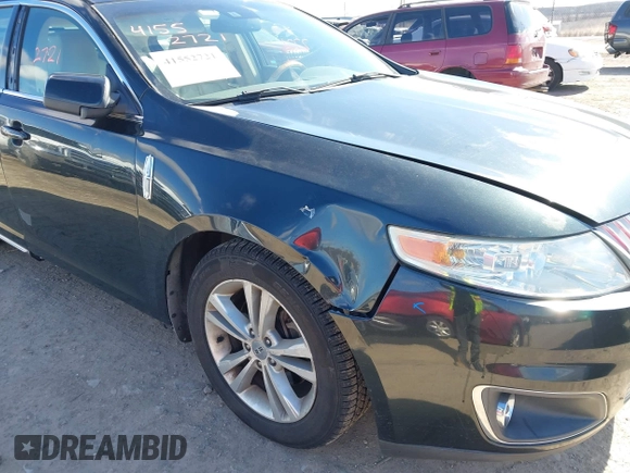 2010 Lincoln MKS with VIN 1LNHL9ER9AG604947, listed as a IAAI auction lot 41552721 with 143,130 mi miles. Bid and sale history available at carsss.com. Image 6.