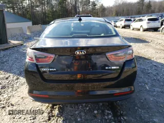 2016 Kia Optima Hybrid EX with VIN KNAGN4AD8G5092056, listed as a Copart auction lot 84051884 with 232,943 mi miles and Salvage Title. Bid and sale history available at carsss.com. Image 6.