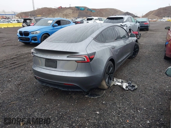 2025 Tesla Model 3 Long Range z VIN 5YJ3E1EA0SF906935, wystawiony jako IAAI lot #41915554 z przebiegiem 1 715 mil mil oraz . Historia ofert i sprzedaży dostępna na DreamBid. Obrazek 4.
