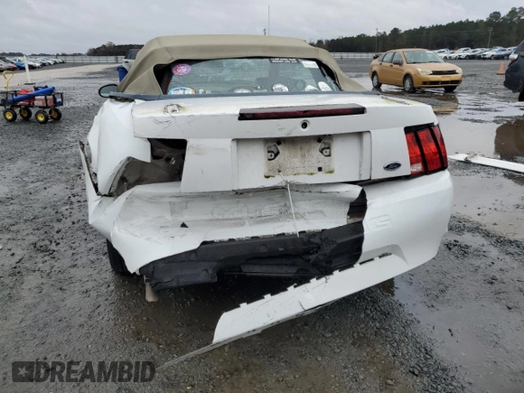 2004 Ford Mustang Deluxe with VIN 1FAFP446X4F179975, listed as a Copart auction lot 84551444 with 75,919 mi miles and Salvage Title. Bid and sale history available at carsss.com. Image 6.