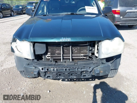 2006 Jeep Grand Cherokee Limited with VIN 1J4HR58NX6C114451, listed as a IAAI auction lot 42093832 with 264,418 mi miles. Bid and sale history available at carsss.com. Image 6.