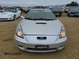 2000 Toyota Celica GTS with VIN JTDDY32T7Y0001953, listed as a Copart auction lot 87116164 with 230,036 mi miles and Salvage Title. Bid and sale history available at carsss.com. Image 5.