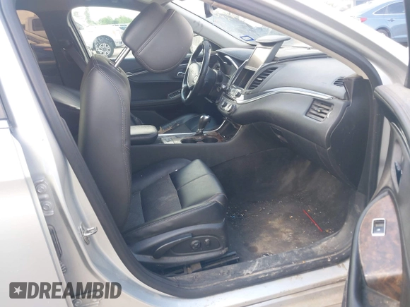 2014 Chevrolet Impala LT with VIN 2G1115SL9E9278164, listed as a IAAI auction lot 42087958 with 242,120 mi miles and . Bid and sale history available at DreamBid. Image 5.
