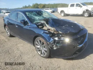2019 Mazda 6 Touring with VIN JM1GL1VM5K1502586, listed as a Copart auction lot 50774985 with 70,088 mi miles and Salvage Title. Bid and sale history available at carsss.com. Image 4.