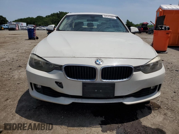 2013 BMW 3 Series 328i with VIN WBA3A5G58DNP21035, listed as a Copart auction lot 60543305 with 151,768 mi miles and Salvage title. Bid and sale history available at DreamBid. Image 5.
