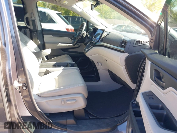 2018 Honda Odyssey EX-L z VIN 5FNRL6H7XJB067694, wystawiony jako IAAI lot #42177338 z przebiegiem 159 670 mil mil oraz . Historia ofert i sprzedaży dostępna na DreamBid. Obrazek 5.