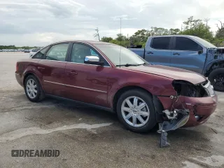 2006 Ford Five Hundred Limited with VIN 1FAFP25196G127452, listed as a Copart auction lot 61756795 with 186,112 mi miles and Salvage title. Bid and sale history available at DreamBid. Image 4.