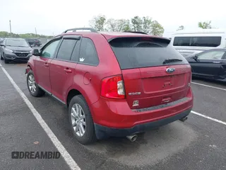 2014 Ford Edge SEL z VIN 2FMDK4JC2EBB09752, wystawiony jako IAAI lot #42180224 z przebiegiem 107 503 mil mil oraz . Historia ofert i sprzedaży dostępna na DreamBid. Obrazek 3.