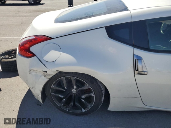 2014 Nissan 370Z Nismo with VIN JN1AZ4EH2EM633022, listed as a Copart auction lot 46947575 with 115,042 mi miles and Salvage Title. Bid and sale history available at DreamBid. Image 10.