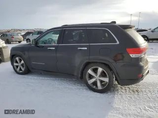 2014 Jeep Grand Cherokee Overland with VIN 1C4RJFCM4EC318893, listed as a Copart auction lot 42163465 with 153,678 mi miles and Clean Title. Bid and sale history available at carsss.com. Image 2.