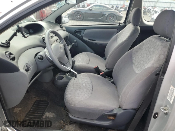 2000 Toyota ECHO with VIN JTDAT1239Y0040310, listed as a Copart auction lot 69115394 with 103,347 mi miles and Salvage Title. Bid and sale history available at DreamBid. Image 7.