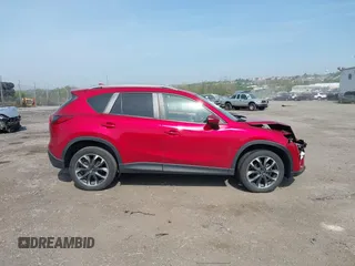 2016 Mazda CX-5 Grand Touring with VIN JM3KE4DY9G0850583, listed as a IAAI auction lot 42075545 with 92,789 mi miles and . Bid and sale history available at carsss.com. Image 13.