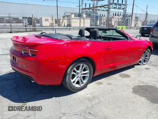 2013 Chevrolet Camaro LT z VIN 2G1FB3D34D9104778, wystawiony jako IAAI lot #42229416 z przebiegiem 99 123 mil mil oraz . Historia ofert i sprzedaży dostępna na DreamBid. Obrazek 4.