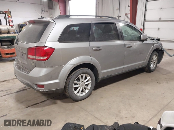 2016 Dodge Journey SXT with VIN 3C4PDCBG0GT198686, listed as a IAAI auction lot 41561007 with 85,289 mi miles. Bid and sale history available at carsss.com. Image 4.