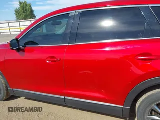 2016 Mazda CX-9 Touring z VIN JM3TCACY9G0122174, wystawiony jako IAAI lot #42613740 z przebiegiem 148 646 mil mil oraz . Historia ofert i sprzedaży dostępna na DreamBid. Obrazek 14.