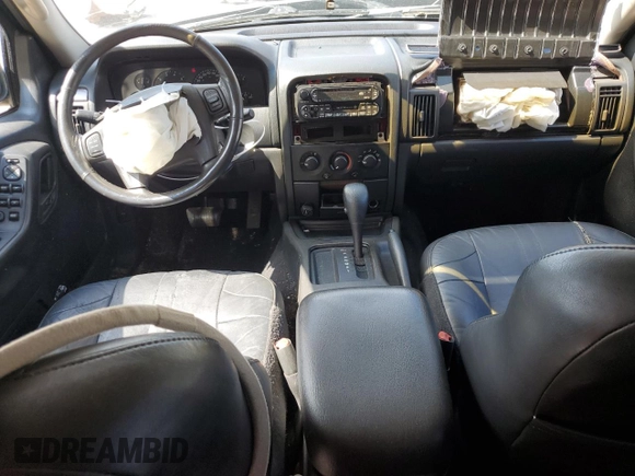 2002 Jeep Grand Cherokee with VIN 1J8GX48S12C255290, listed as a Copart auction lot 57832025 with 191,293 mi miles and Non repairable. Bid and sale history available at DreamBid. Image 8.