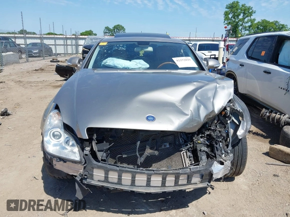 2006 Mercedes-Benz CLS 500 z VIN WDDDJ75X06A037541, wystawiony jako IAAI lot #42252829 z przebiegiem 151 295 mil mil oraz . Historia ofert i sprzedaży dostępna na DreamBid. Obrazek 13.